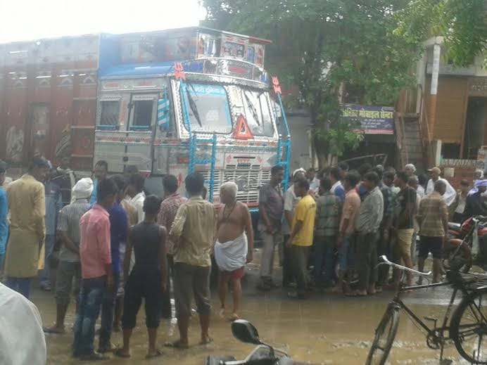 youth crushed under the truck, dead