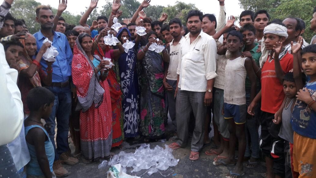 People demonstrate against raw alcohol
