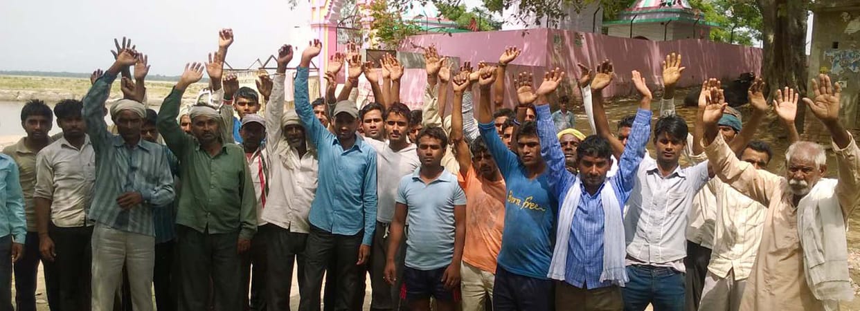 Angry family members protest.