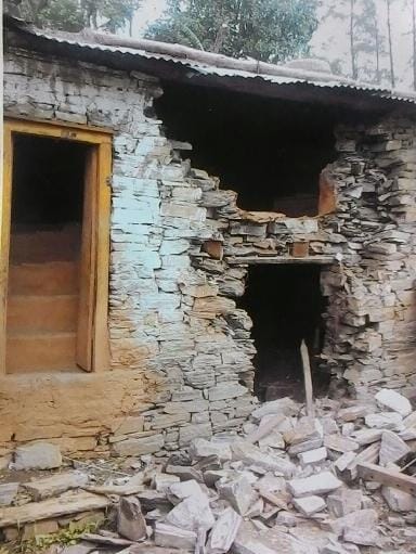 Broken wall of house