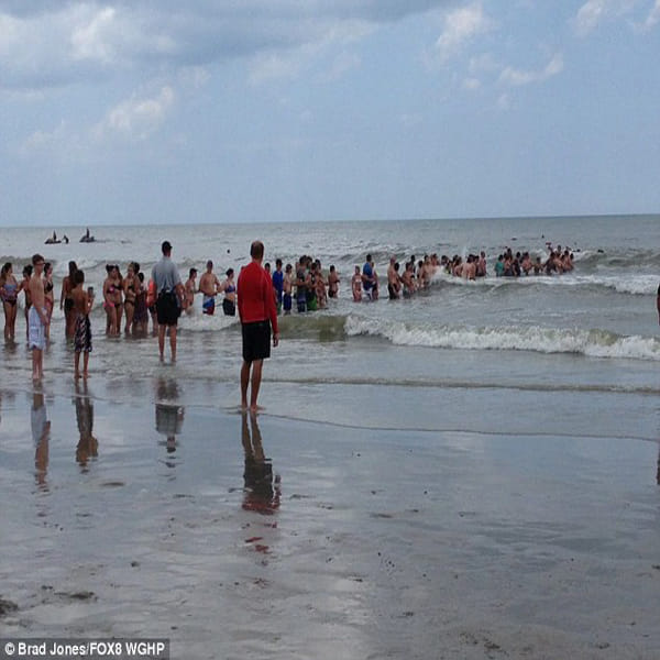'human chain' of nearly 150 people to rescue missing 14-year-old swimmer at Myrtle Beach