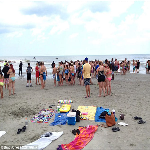 'human chain' of nearly 150 people to rescue missing 14-year-old swimmer at Myrtle Beach