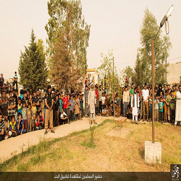 ISIS militants savagely stoning four married men to death for 'committing adultery' in Iraq