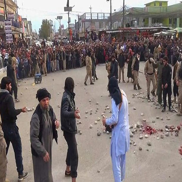 ISIS militants savagely stoning four married men to death for 'committing adultery' in Iraq