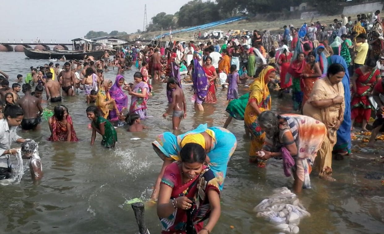 Devotees dip