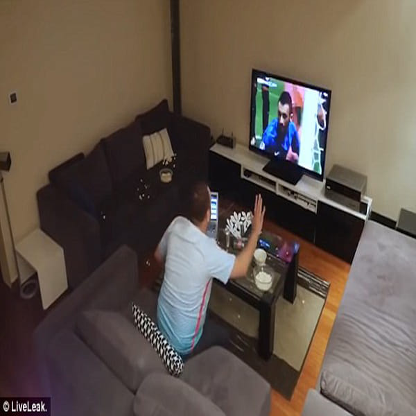 Turkish football fan smashes TV after wife pranks him by turning off the TV as he watching EURO 2016