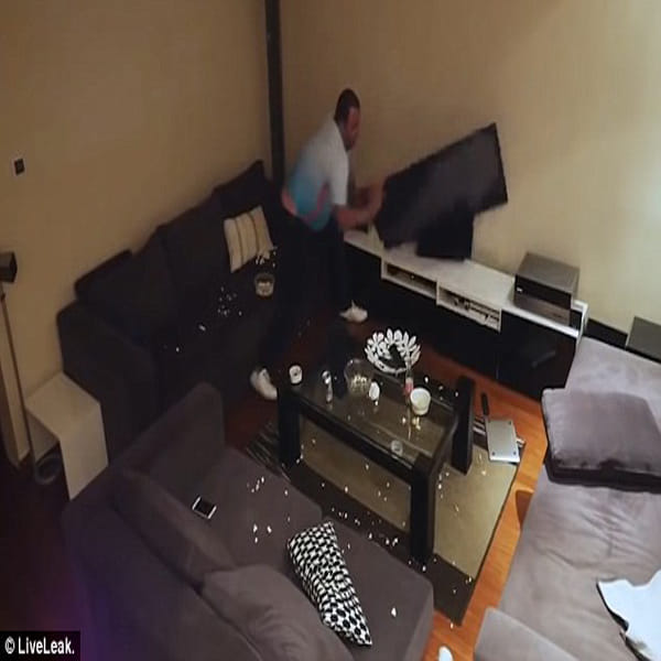 Turkish football fan smashes TV after wife pranks him by turning off the TV as he watching EURO 2016