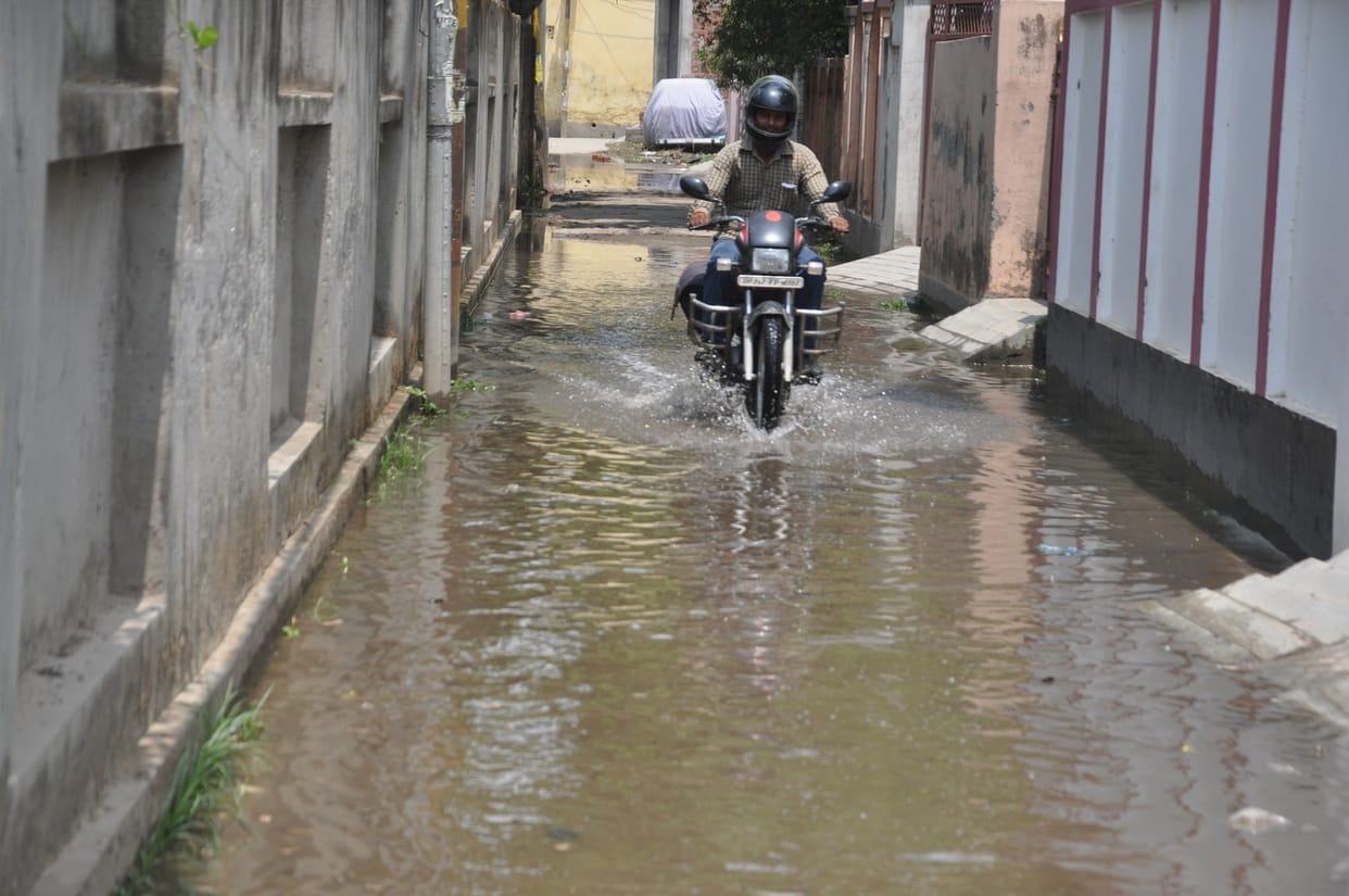 Gutter water are flows on the road