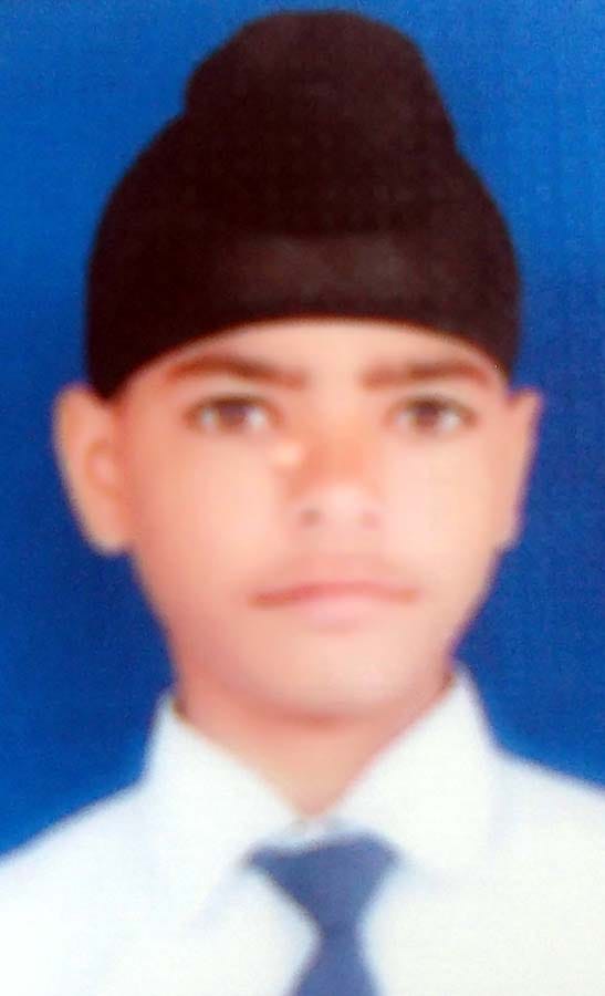 Tractor overturns , killing teenager