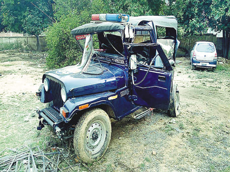 A truck rams into a police jeep