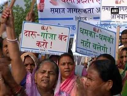 Kicking the bottle: Residents of south-west Delhi protest demanding liquor ban