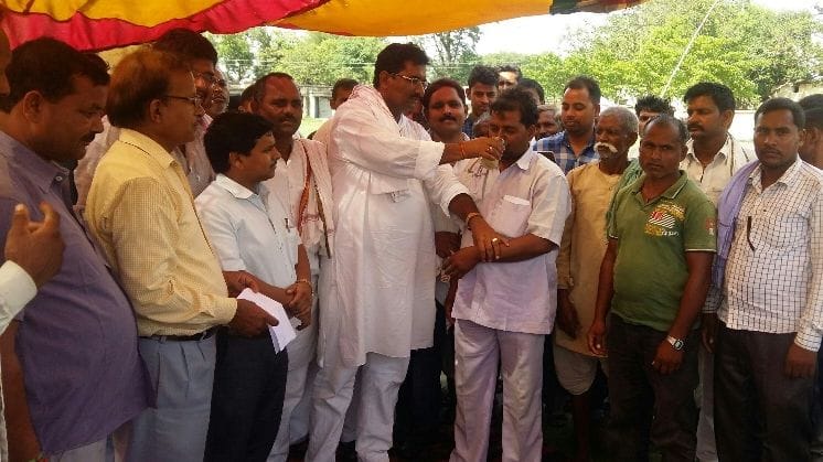 protest against scam over