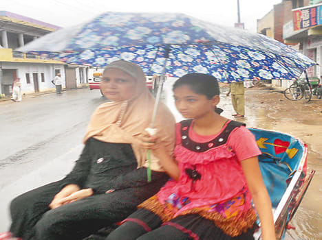 Rain showers weather cold, heat relief