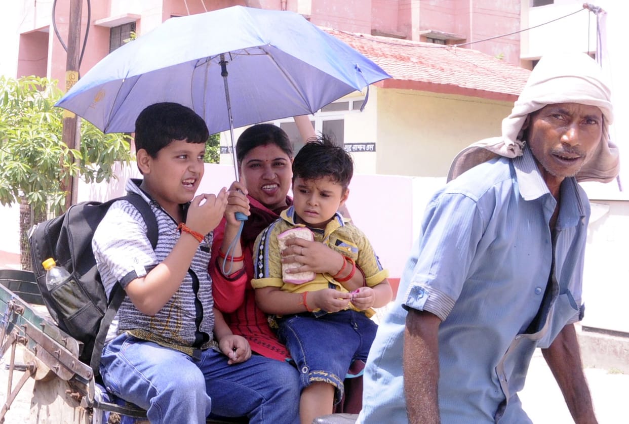 People suffering from the heat and humidity of the day