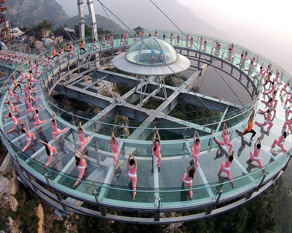 yoga fans gathered on glass bottom in china
