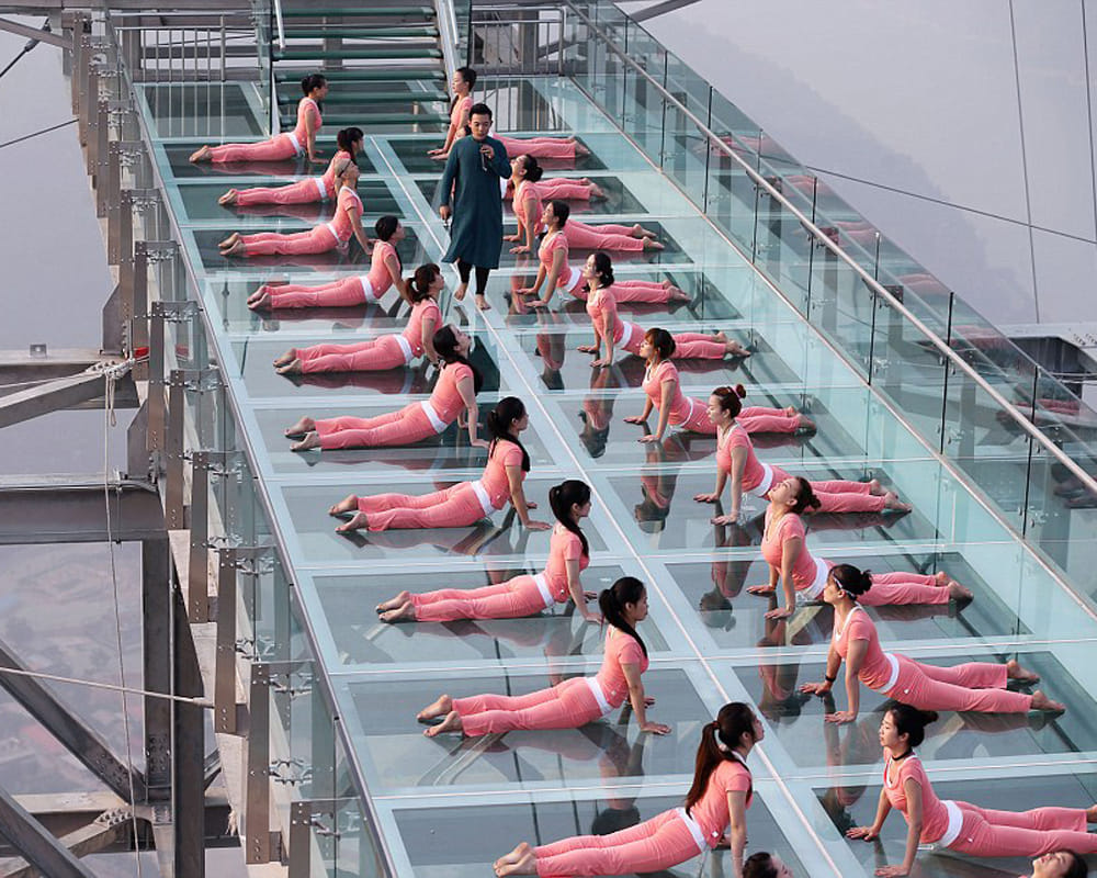 yoga fans gathered on glass bottom in china