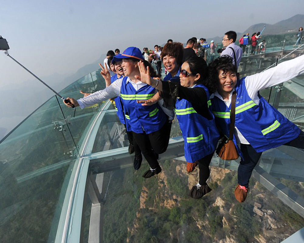 yoga fans gathered on glass bottom in china
