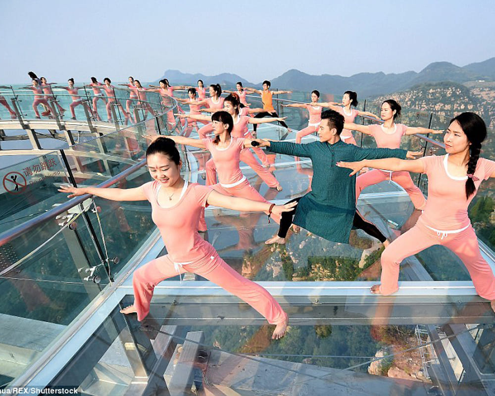 yoga fans gathered on glass bottom in china