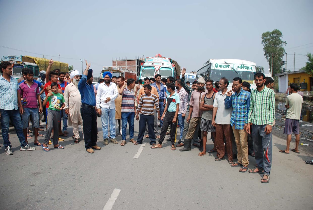 people on highway, protest