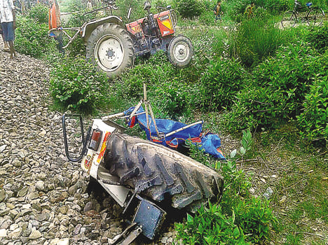 at railway crossing tractor collied