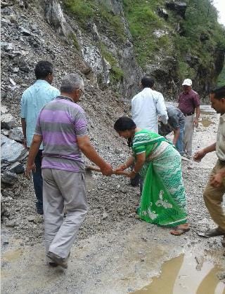 Female pradhan removed debris 