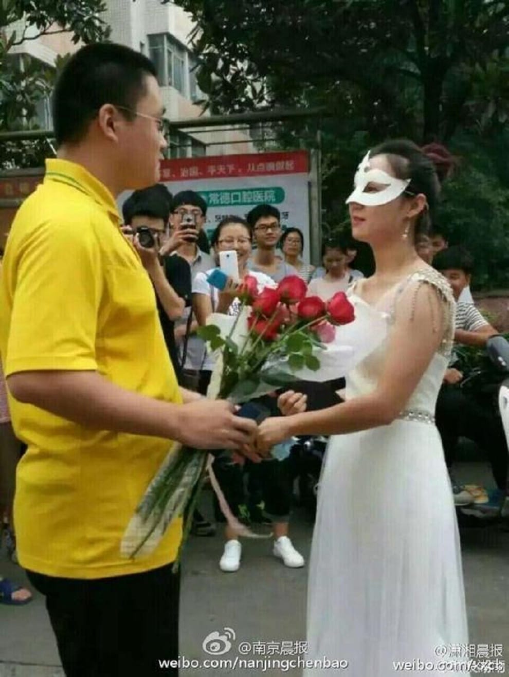 professor wears wedding dress to propose to student