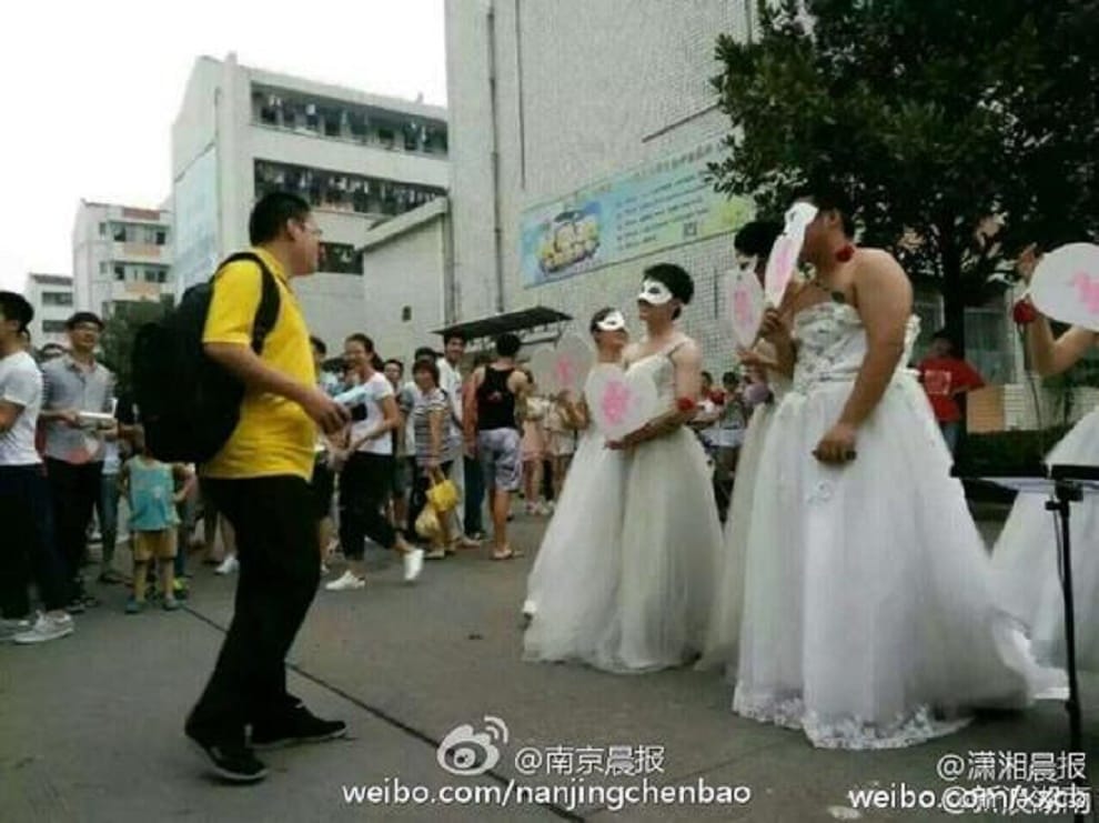 professor wears wedding dress to propose to student