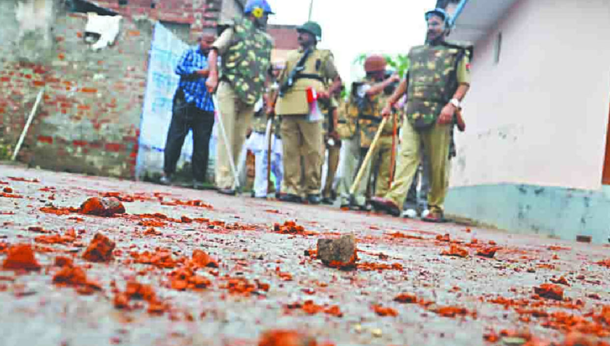 lathicharge after fight between two groups