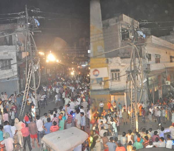 lineman dead body sticked to hightension wires, people become spectator in ludhiana