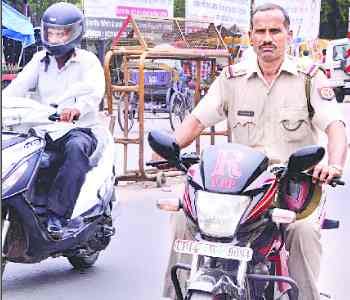 Wear helmets campaign is running on paper 