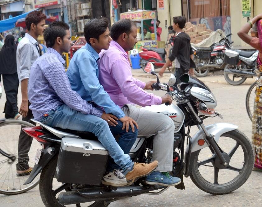 High Court's instruction - helmets should be on the heads of two wheeler riders