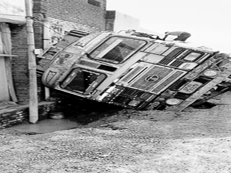 Houses damaged by uncontrollable truck overturns