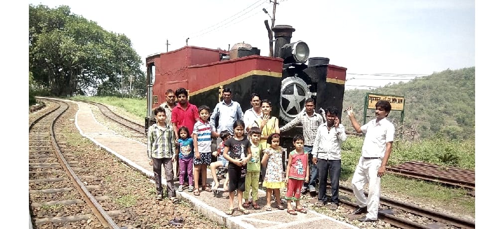 Tourists have to wait for travel in steam engine on shimla kalka railway.