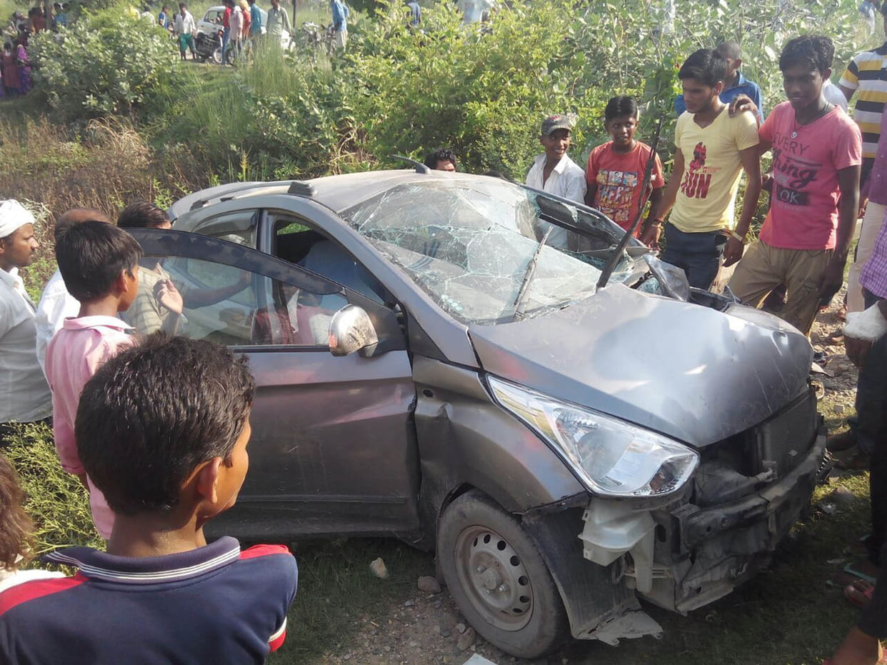  Goods train crashed into the car , three injured