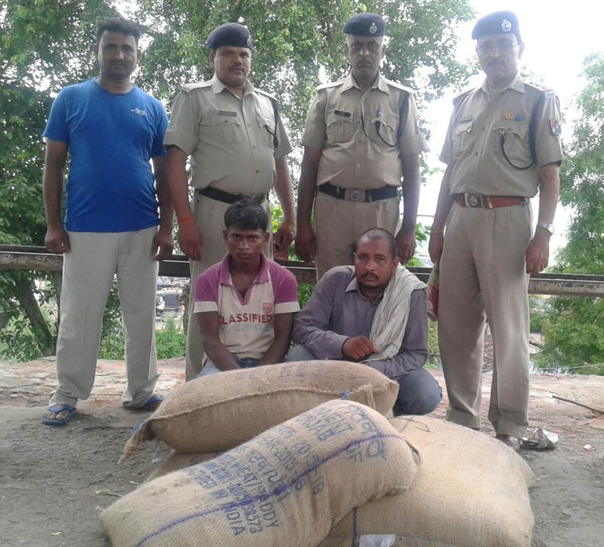 Two men arrested for stealing bags of rice