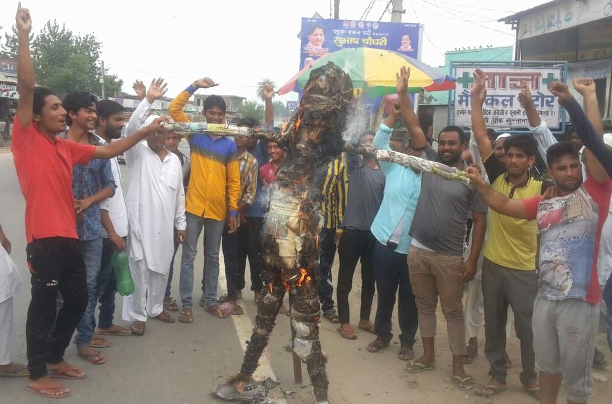 bsp workers burnt the effigy of party state incharge