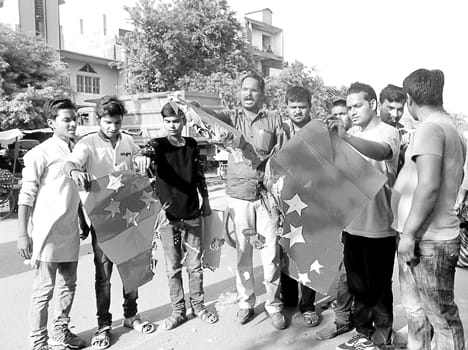 ABVP activists blew the flag of China