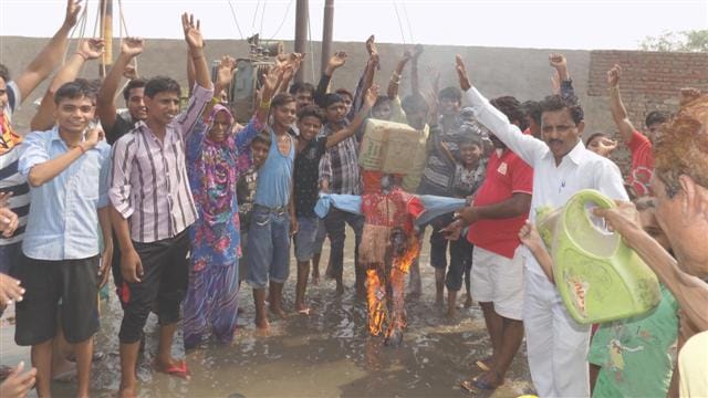 Logging protests , burnt effigies