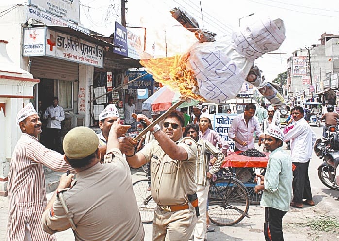 AAP workers clash with police