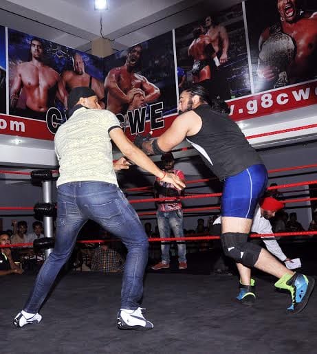 cricketer harbhajan singh fight with the great khali student in wrestling ring in jalandhar