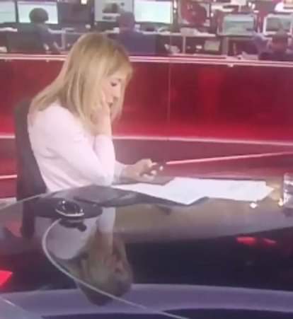  BBC newsreader caught texting on air as show goes live