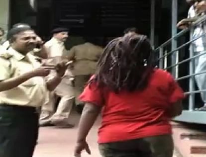 Drunk Nigerian woman tied with rope after she attacks shopkeepers 