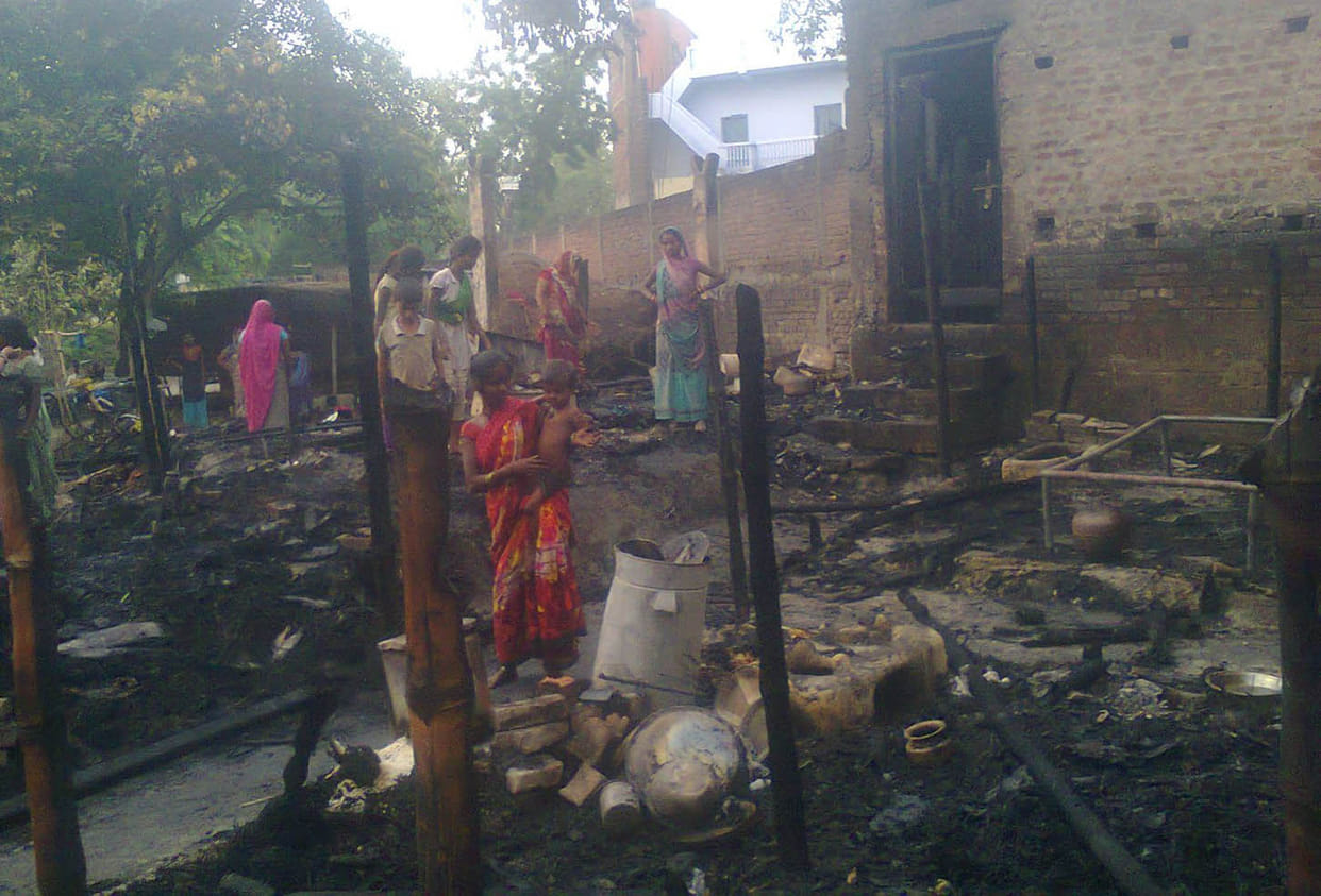 8 huts on fire