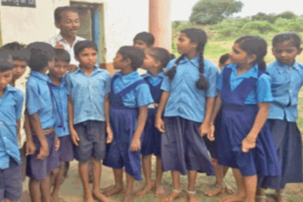 karnataka Teacher climbs a mountain everyday to keep school going
