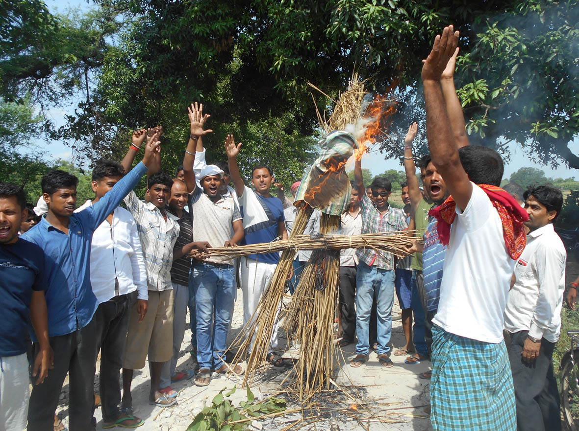 Burned effigies of BJP MLA