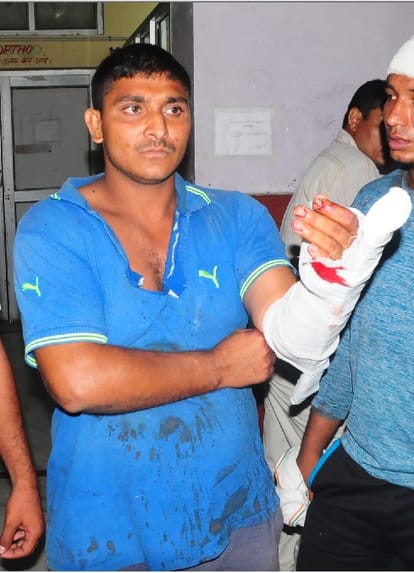 firing, two groups firing, rohtak village firing, national player injured in firing