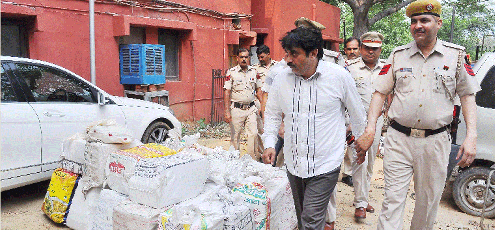 brought alcohal in Mercedes,  IB officer arrested in trafficking