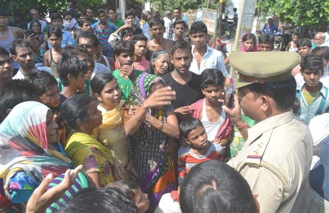 Water blocked the road , burnt effigies