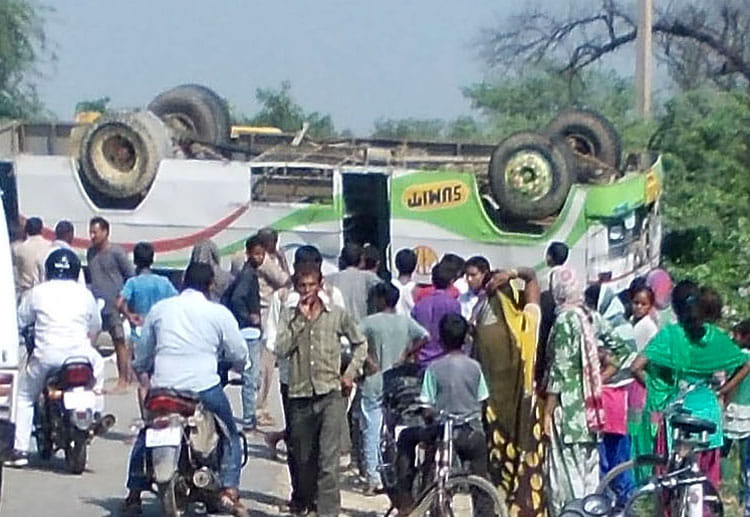 bus fired, Helper died, 40 injured.