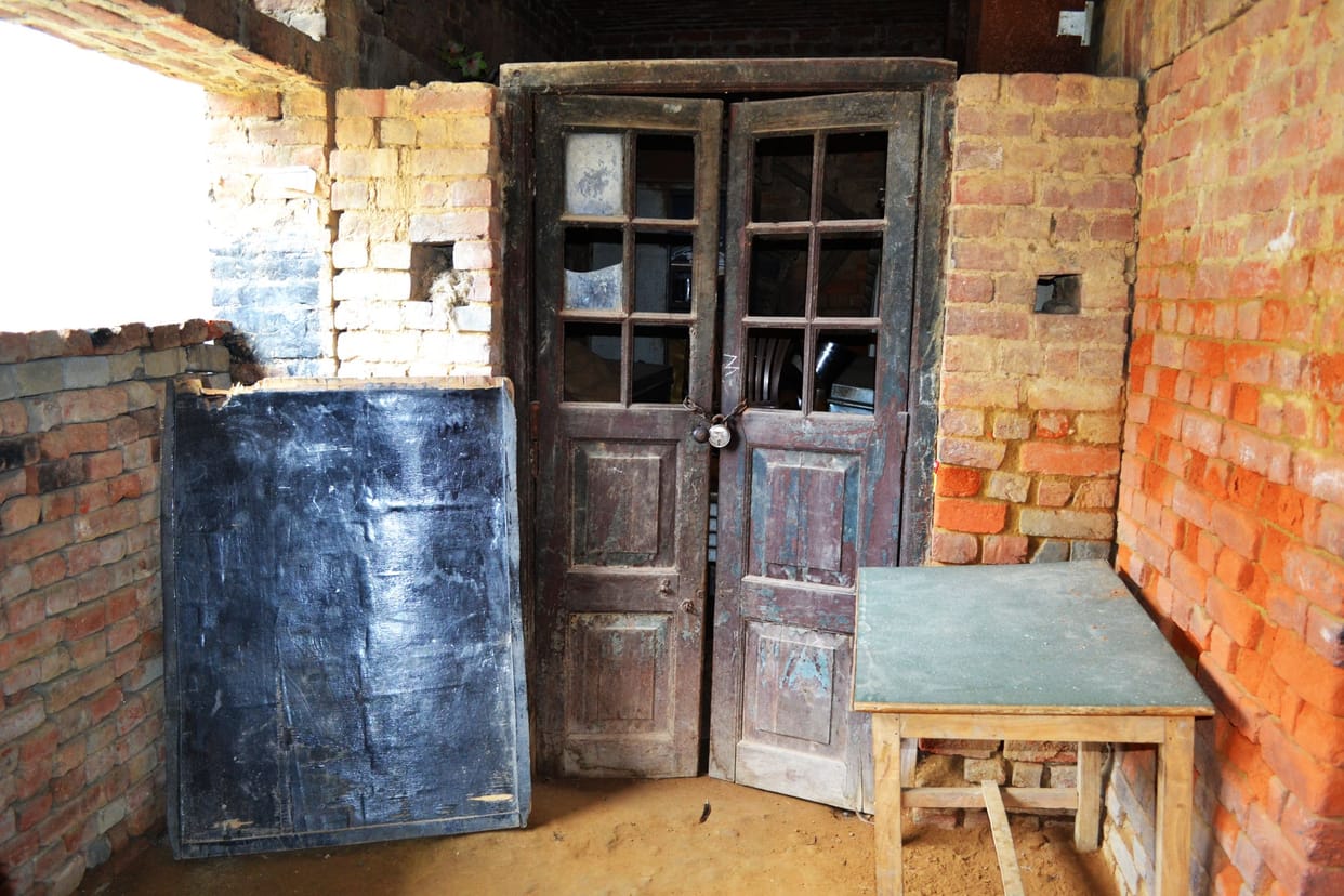 Somewhere in the shabby house somewhere new running two schools
